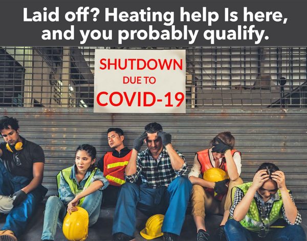 Workers in safety gear sit dejectedly against a closed metal gate. A sign reads "Shutdown Due to COVID-19."