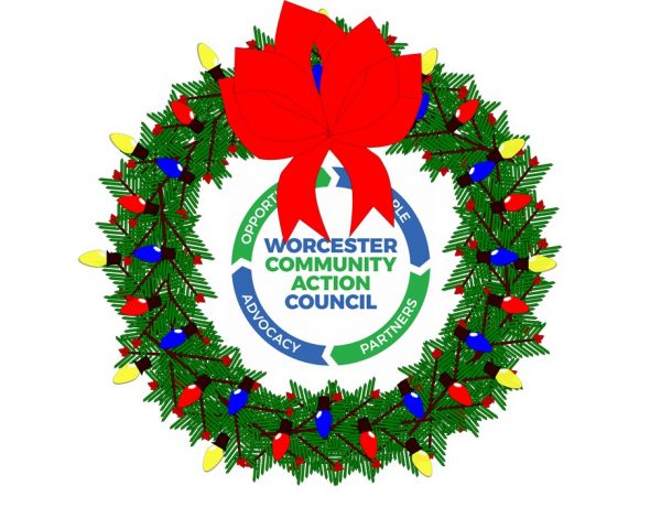 WCAC logo inside a festive holiday holly wreath.
